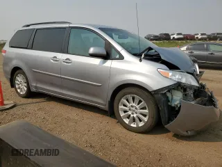 2014 Toyota Sienna Limited with VIN 5TDDK3DC4ES073698, listed as a Copart auction lot 60848915 with 418,121 mi miles and Salvage title. Bid and sale history available at DreamBid. Image 4.