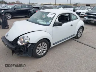 2018 Volkswagen Beetle S with VIN 3VWFD7AT4JM701569, listed as a IAAI auction lot 41106340 with 78,754 mi miles. Bid and sale history available at carsss.com. Image 2.