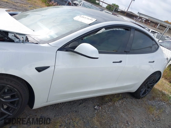 2024 Tesla Model 3 Long Range with VIN 5YJ3E1EB7RF854092, listed as a IAAI auction lot 41697646 with 7,371 mi miles and . Bid and sale history available at DreamBid. Image 14.