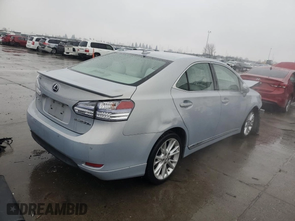 2010 Lexus HS 250h with VIN JTHBB1BAXA2003202, listed as a Copart auction lot 87448764 with 60,974 mi miles and Salvage Title. Bid and sale history available at DreamBid. Image 3.