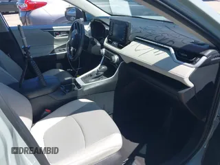 2021 Toyota RAV4 XLE Premium with VIN 2T3C1RFV0MW140682, listed as a IAAI auction lot 42315813 with 98,267 mi miles and . Bid and sale history available at DreamBid. Image 5.
