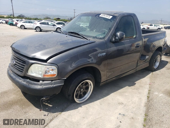 2003 Ford F-150 Lightning with VIN 2FTRF07303CA83240, listed as a Copart auction lot 52941975 with 0 mi miles and Salvage Title. Bid and sale history available at carsss.com. Image 1.