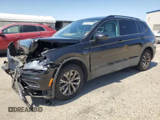2018 Volkswagen Tiguan S with VIN 3VV1B7AXXJM069099, listed as a Copart auction lot 52345235 with 79,359 mi miles and Salvage title. Bid and sale history available at DreamBid. Image 1.