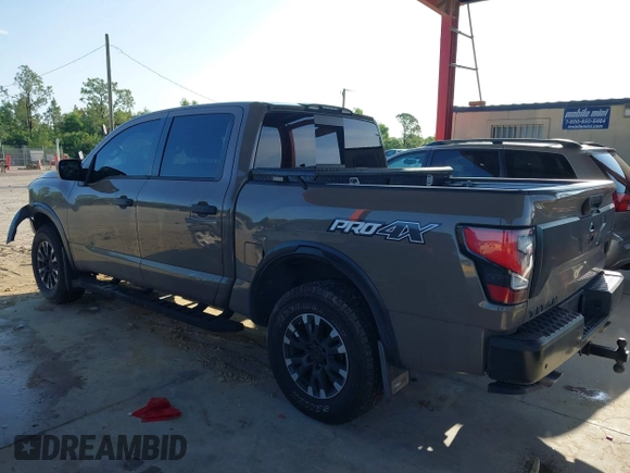 2021 Nissan Titan SV with VIN 1N6AA1ED1MN523973, listed as a IAAI auction lot 42406382 with 73,688 mi miles and . Bid and sale history available at DreamBid. Image 3.