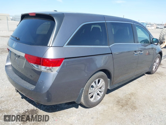 2014 Honda Odyssey EX-L with VIN 5FNRL5H67EB096027, listed as a IAAI auction lot 41950398 with 147,158 mi miles and . Bid and sale history available at DreamBid. Image 4.