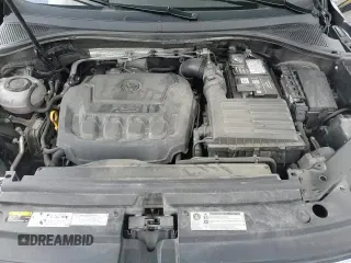 2018 Volkswagen Tiguan S с VIN 3VV0B7AX0JM057250, выставлен на аукционе Copart как лот 70381245 с пробегом 82 248 миль миль и Списание • Salvage title. История ставок и продаж доступна на DreamBid. Изображение 14.