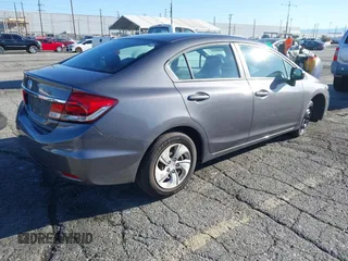 2015 Honda Civic Sedan LX with VIN 19XFB2E51FE061538, listed as a IAAI auction lot 41761473 with 113,404 mi miles. Bid and sale history available at carsss.com. Image 4.