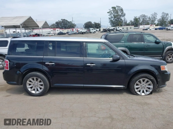2011 Ford Flex SEL z VIN 2FMGK5CC9BBD24203, wystawiony jako IAAI lot #42246936 z przebiegiem 168 500 mil mil oraz . Historia ofert i sprzedaży dostępna na DreamBid. Obrazek 14.