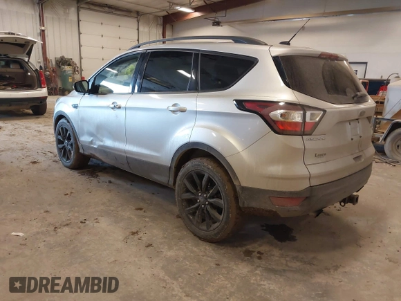 2017 Ford Escape Titanium with VIN 1FMCU9J94HUD92984, listed as a IAAI auction lot 41708720 with 176,550 mi miles. Bid and sale history available at carsss.com. Image 3.