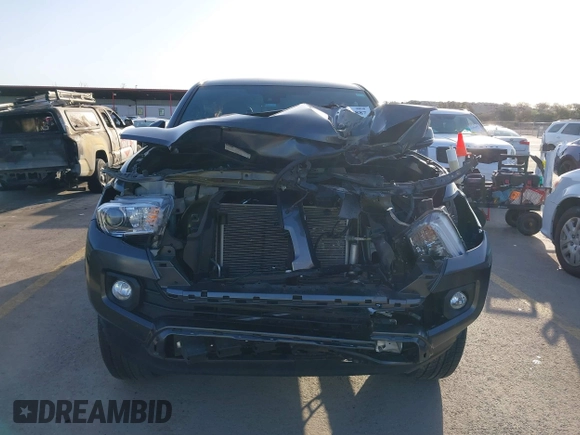 2023 Toyota Tacoma 4WD SR with VIN 3TMCZ5AN7PM587833, listed as a IAAI auction lot 41853887 with 16,532 mi miles. Bid and sale history available at carsss.com. Image 12.