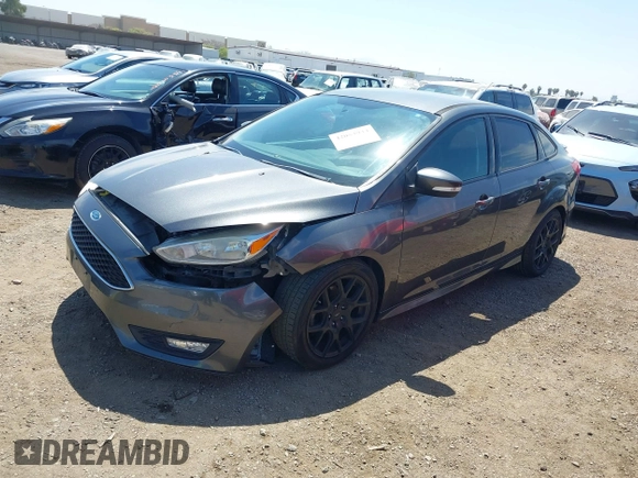2016 Ford Focus SE with VIN 1FADP3F21GL268058, listed as a IAAI auction lot 42053944 with 103,785 mi miles and . Bid and sale history available at DreamBid. Image 2.