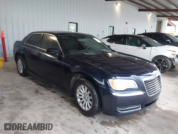 2011 Chrysler 300 with VIN 2C3CA4CGXBH523474, listed as a IAAI auction lot 41673690 with 187,389 mi miles. Bid and sale history available at carsss.com. Image 1.