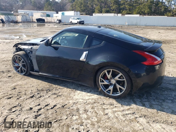 2016 Nissan 370Z with VIN JN1AZ4EH6GM934024, listed as a Copart auction lot 43826185 with 158,973 mi miles and Salvage Title. Bid and sale history available at carsss.com. Image 2.