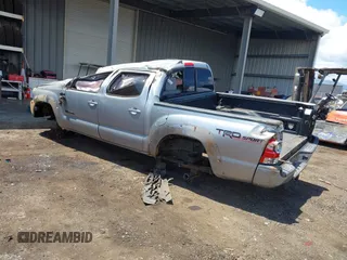 2015 Toyota Tacoma with VIN 3TMLU4ENXFM185841, listed as a IAAI auction lot 41896752 with 111,629 mi miles and . Bid and sale history available at DreamBid. Image 3.