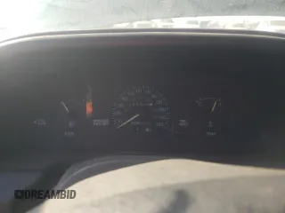 1995 Ford Escort z VIN 1FASP14J9SW304866, wystawiony jako Copart lot #73006174 z przebiegiem 126 068 mil mil oraz Szkoda całkowita • Salvage title. Historia ofert i sprzedaży dostępna na DreamBid. Obrazek 9.