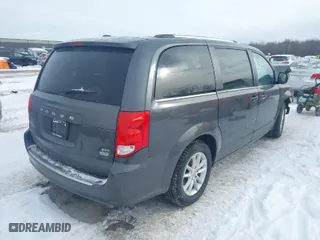2018 Dodge Grand Caravan SXT with VIN 2C4RDGCG2JR325737, listed as a IAAI auction lot 41610173 with 97,492 mi miles. Bid and sale history available at carsss.com. Image 4.