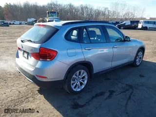 2013 BMW X1 xDrive28i with VIN WBAVL1C57DVR84747, listed as a IAAI auction lot 41273794 with 93,738 mi miles. Bid and sale history available at carsss.com. Image 4.