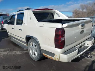 2011 Chevrolet Avalanche LTZ with VIN 3GNTKGE38BG349917, listed as a IAAI auction lot 41209473 with 210,616 mi miles. Bid and sale history available at carsss.com. Image 3.