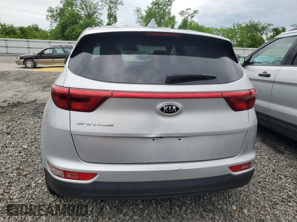 2018 Kia Sportage LX z VIN KNDPMCAC4J7446934, wystawiony jako Copart lot #53712435 z przebiegiem 72 974 mil mil oraz Szkoda całkowita • Salvage title. Historia ofert i sprzedaży dostępna na DreamBid. Obrazek 6.