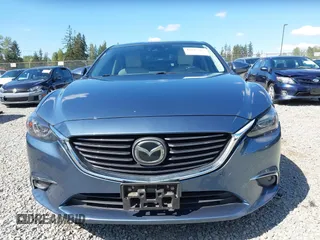 2016 Mazda Mazda6 i Grand Touring with VIN JM1GJ1W51G1436977, listed as a IAAI auction lot 42097363 with 128,941 mi miles. Bid and sale history available at carsss.com. Image 12.