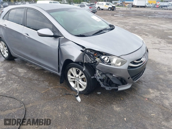 2013 Hyundai Elantra GT with VIN KMHD35LE1DU058318, listed as a IAAI auction lot 42036716 with 146,845 mi miles. Bid and sale history available at carsss.com. Image 6.