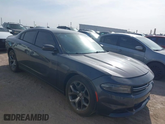 2015 Dodge Charger SXT with VIN 2C3CDXHG4FH890684, listed as a IAAI auction lot 41896958 with 118,140 mi miles and . Bid and sale history available at DreamBid. Image 1.