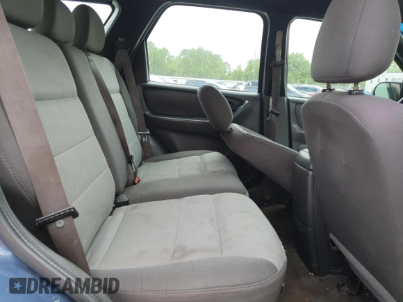 2005 Ford Escape XLS Value with VIN 1FMYU92Z95DA22100, listed as a Copart auction lot 57874705 with 192,057 mi miles and Salvage title. Bid and sale history available at DreamBid. Image 11.