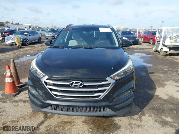 2017 Hyundai Tucson SE Plus with VIN KM8J33A41HU327540, listed as a IAAI auction lot 41820850 with 129,227 mi miles. Bid and sale history available at carsss.com. Image 6.