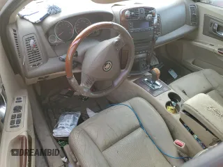 2006 Cadillac CTS with VIN 1G6DM57T560148515, listed as a Copart auction lot 77073384 with Not Provided miles and Salvage Title. Bid and sale history available at carsss.com. Image 8.