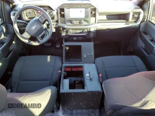 2023 Ford F-150 with VIN 1FTFW1P85PKD82406, listed as a Copart auction lot 84744944 with 32,982 mi miles and Salvage title. Bid and sale history available at DreamBid. Image 8.
