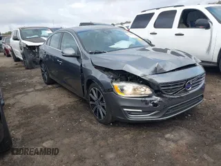 2017 Volvo S60 Inscription with VIN LYV402HK4HB127187, listed as a IAAI auction lot 41653283 with 72,667 mi miles. Bid and sale history available at carsss.com. Image 1.