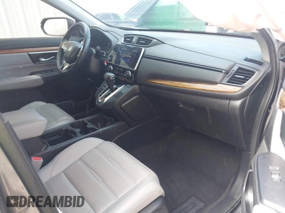 2018 Honda CR-V Touring with VIN 7FARW1H9XJE018575, listed as a IAAI auction lot 41747192 with 83,699 mi miles and . Bid and sale history available at carsss.com. Image 5.