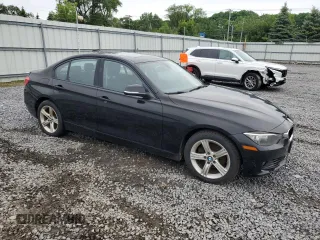 2015 BMW 3 Series 328i xDrive with VIN WBA3B3C53FF546682, listed as a Copart auction lot 62688285 with 161,104 mi miles and Clean title. Bid and sale history available at DreamBid. Image 4.
