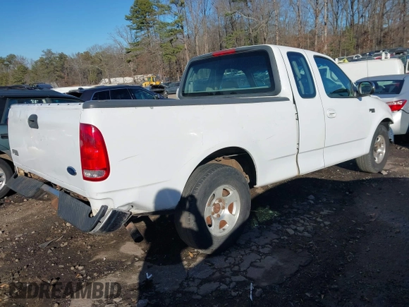 1999 Ford F-150 with VIN 1FTZX1728XNA81813, listed as a IAAI auction lot 41367154 with 149,103 mi miles and . Bid and sale history available at DreamBid. Image 4.