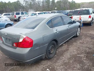 2006 Infiniti M45 Sport with VIN JNKBY01E56M201498, listed as a IAAI auction lot 41498261 with 241,810 mi miles. Bid and sale history available at carsss.com. Image 4.