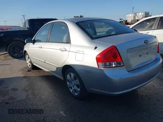 2009 Kia Spectra EX with VIN KNAFE221795620189, listed as a IAAI auction lot 41946984 with 131,913 mi miles. Bid and sale history available at carsss.com. Image 3.