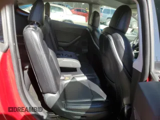 2021 Tesla Model Y Long Range with VIN 5YJYGAEE4MF260627, listed as a Copart auction lot 49091655 with 67,850 mi miles and Salvage Title. Bid and sale history available at DreamBid. Image 11.