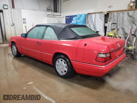 1994 Mercedes-Benz E 320 with VIN WDBEA66E8RC044069, listed as a Copart auction lot 87713565 with 69,061 mi miles and Salvage Title. Bid and sale history available at DreamBid. Image 2.