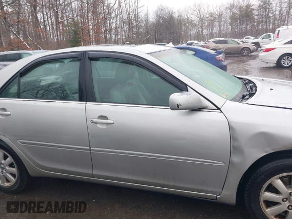 2004 Toyota Camry LE with VIN 4T1BF30K14U578385, listed as a IAAI auction lot 41547709 with 217,434 mi miles. Bid and sale history available at carsss.com. Image 13.