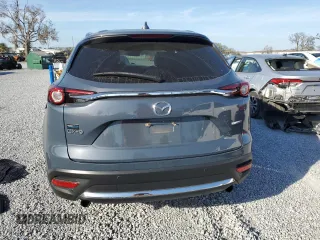 2021 Mazda CX-9 Grand Touring with VIN JM3TCADY1M0517525, listed as a Copart auction lot 43868965 with 123,602 mi miles and Salvage title. Bid and sale history available at DreamBid. Image 6.