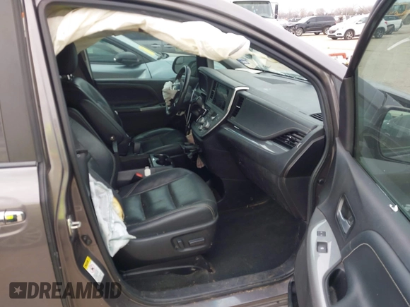 2015 Toyota Sienna SE with VIN 5TDXK3DC8FS652966, listed as a IAAI auction lot 41576611 with 108,858 mi miles and . Bid and sale history available at DreamBid. Image 5.