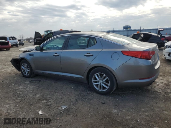 2013 Kia Optima LX z VIN 5XXGM4A70DG221110, wystawiony jako Copart lot #83440674 z przebiegiem Nie podano mil oraz Szkody całkowita. Historia ofert i sprzedaży dostępna na DreamBid. Obrazek 2.