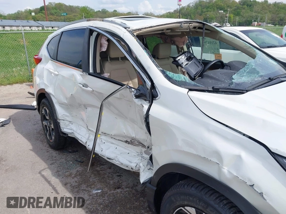 2018 Honda CR-V Touring with VIN 5J6RW2H99JL020598, listed as a IAAI auction lot 42104765 with 30,431 mi miles and . Bid and sale history available at carsss.com. Image 6.