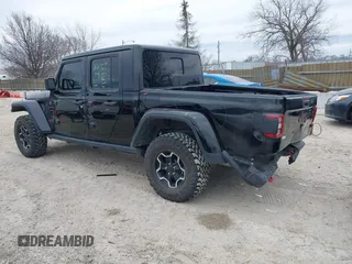 2022 Jeep Gladiator Rubicon with VIN 1C6JJTBG7NL145501, listed as a IAAI auction lot 41506842 with 20,593 mi miles and . Bid and sale history available at DreamBid. Image 3.
