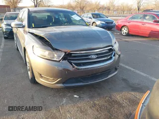 2013 Ford Taurus SEL with VIN 1FAHP2H82DG115528, listed as a IAAI auction lot 41319142 with 153,707 mi miles and . Bid and sale history available at DreamBid. Image 6.