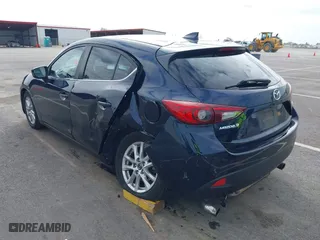 2016 Mazda Mazda3 i Grand Touring with VIN JM1BM1N74G1319656, listed as a IAAI auction lot 41561603 with 123,610 mi miles. Bid and sale history available at carsss.com. Image 3.