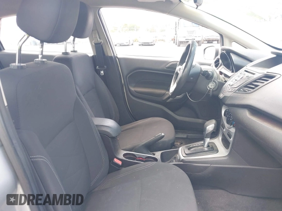 2016 Ford Fiesta SE with VIN 3FADP4BJ6GM122174, listed as a IAAI auction lot 42161294 with 138,090 mi miles. Bid and sale history available at carsss.com. Image 5.