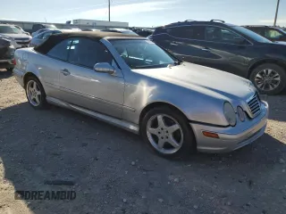 2002 Mercedes-Benz CLK 320/430 with VIN WDBLK70GX2T106873, listed as a Copart auction lot 71202824 with 140,233 mi miles and Salvage Title. Bid and sale history available at DreamBid. Image 4.