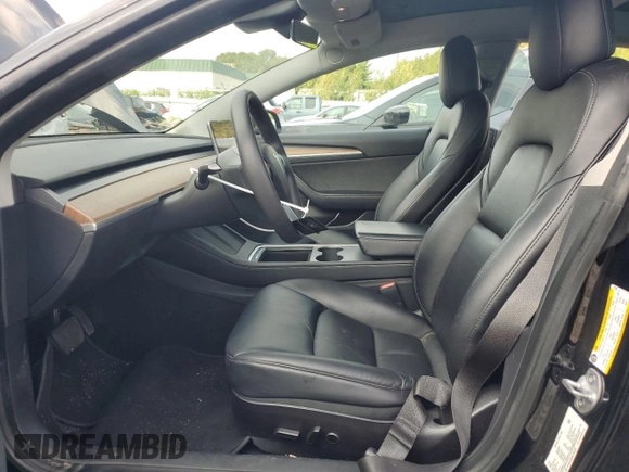 2022 Tesla Model 3 with VIN 5YJ3E1EA5NF186293, listed as a Copart auction lot 66789134 with 71,471 mi miles and Salvage Title. Bid and sale history available at DreamBid. Image 7.