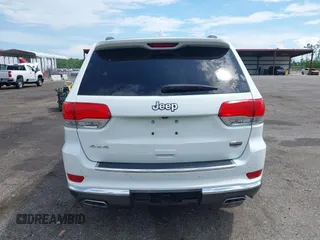 2014 Jeep Grand Cherokee Summit with VIN 1C4RJFJT6EC281114, listed as a IAAI auction lot 42497582 with 128,181 mi miles and . Bid and sale history available at DreamBid. Image 16.